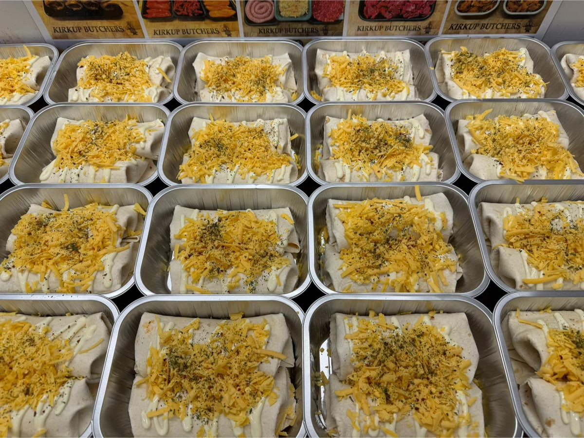Shredded Southwest chicken, mixed peppers and mozzarella enchiladas (per tray)